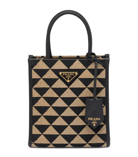 prada handbag logos|Prada logo plaque tote bag.